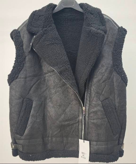 Colete de pele pêssego com pêlos de borrego