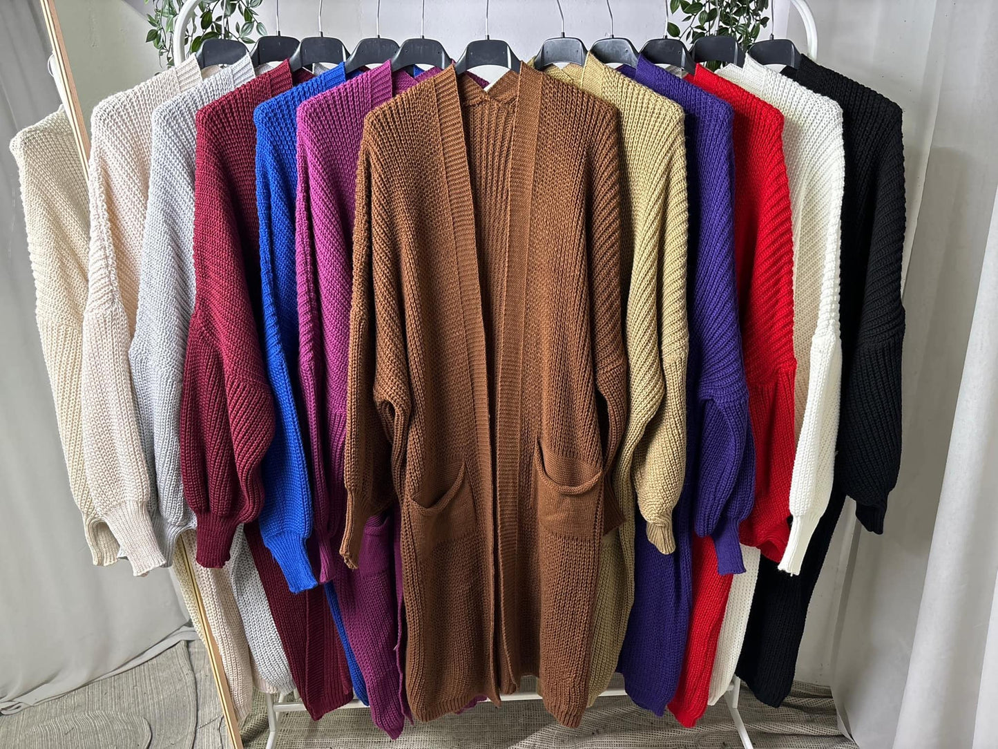 Casaco malha com bolsos