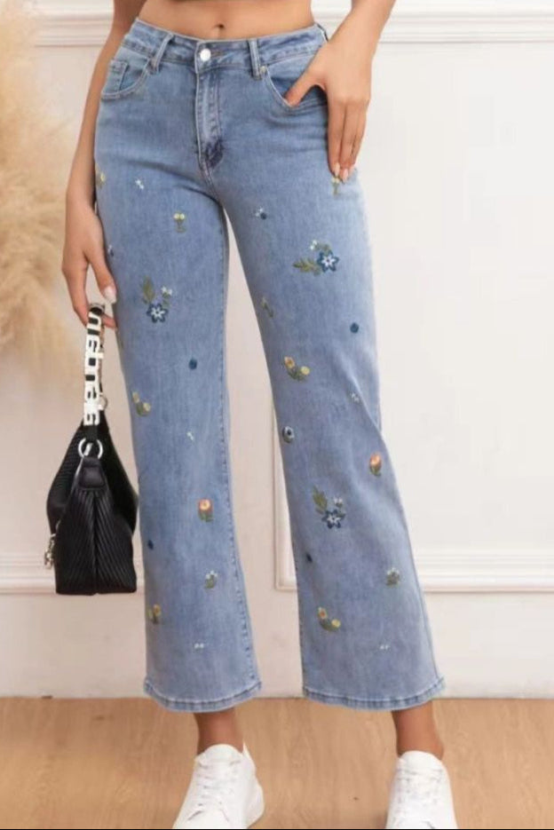 Calça de ganga bordado de flores