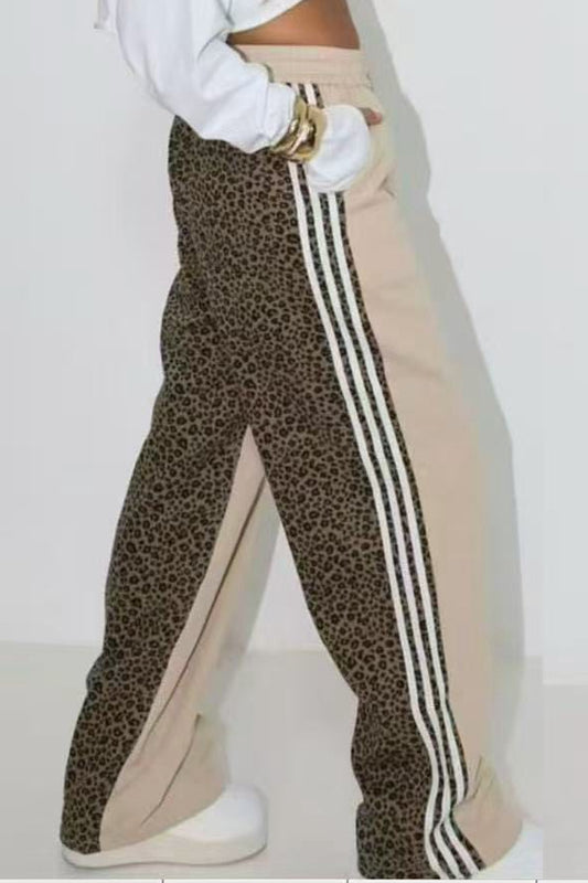 Calça dupe Adidas tigresa